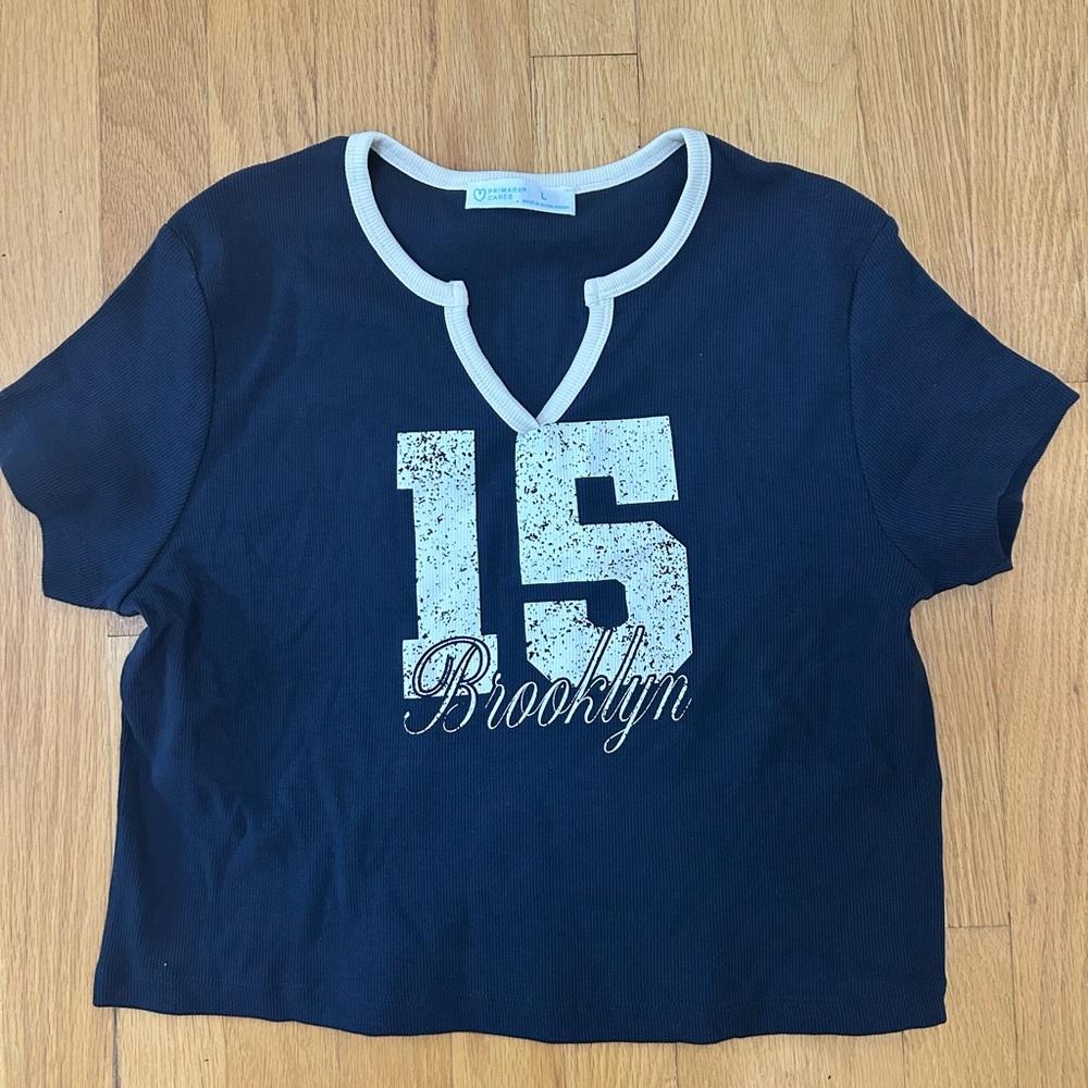 Primark Blue and White Short Sleeve Tee with Sporty Graphic